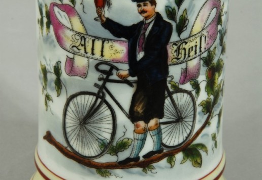 Decorative tankard 23 cm with bicycle motif