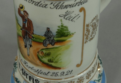 Decorative tankard 25 cm with bicycle motif