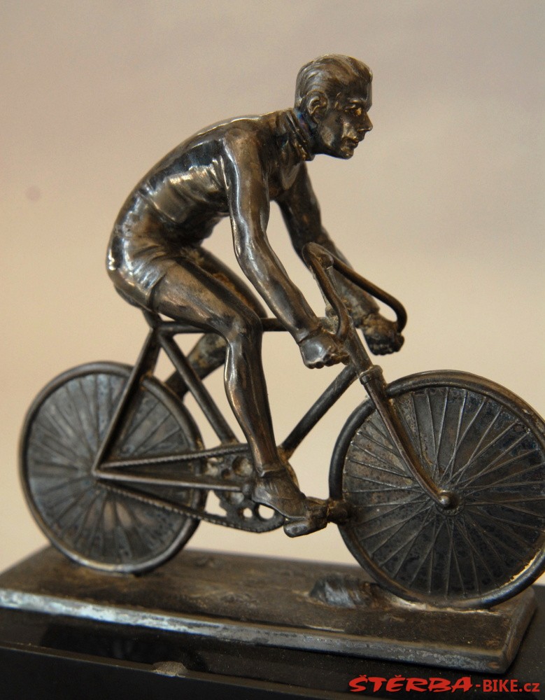 Těžítko se soškou cyklisty - cca 1930