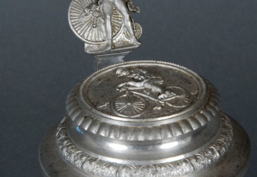 2 decorative glass tankards with bicycle motif  