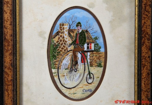Picture with embroiderlly motif  
