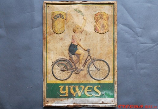 "YWES"  wall sign