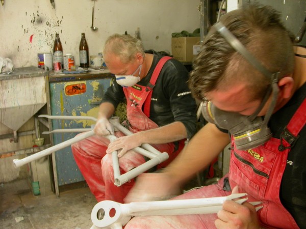 Painting the frames of historical bicycles